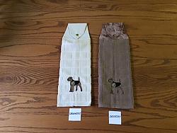 Embroidered snap towels Airedale dogs